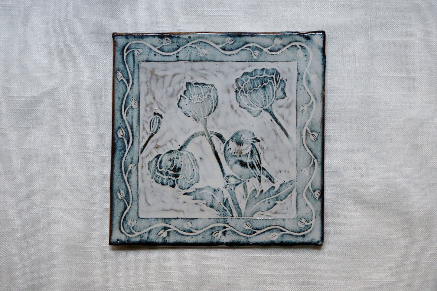 Kakelplatta sgraffito sångglasögonfågel