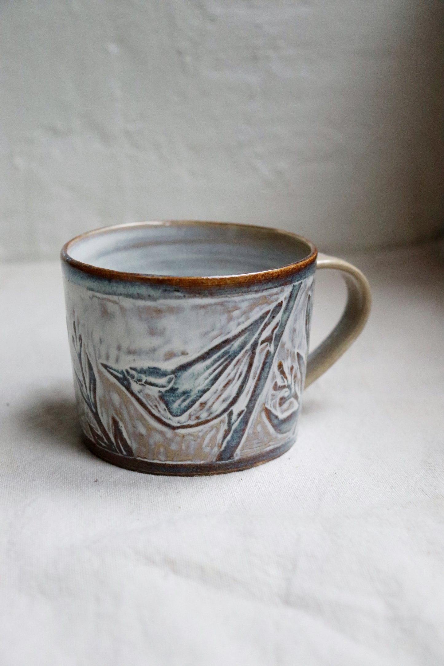 Sgraffitokopp - nötväcka